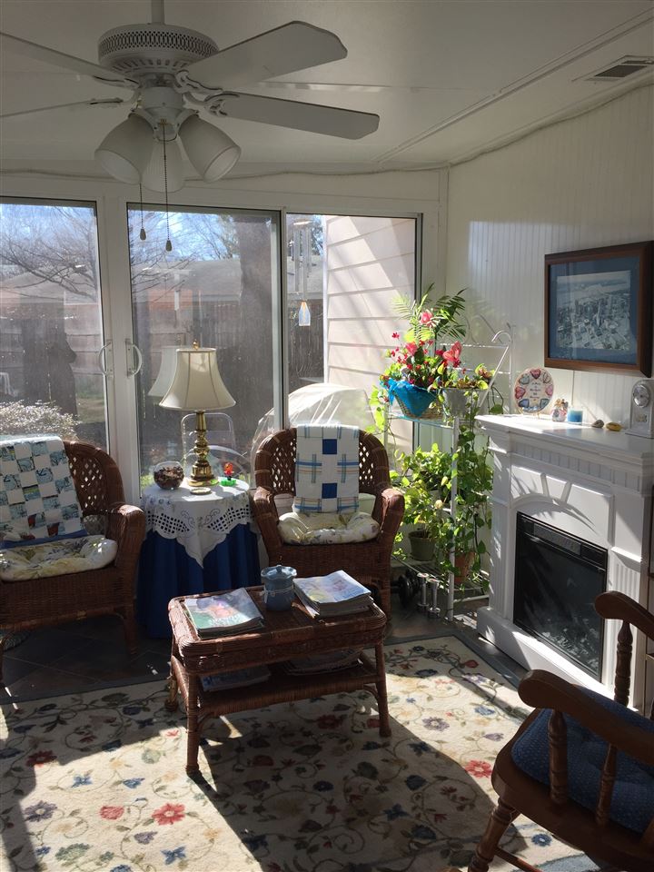 1464 Walton Road Memphis, TN 38117 - Photo 13 of 25 a living room with furniture and a fireplace