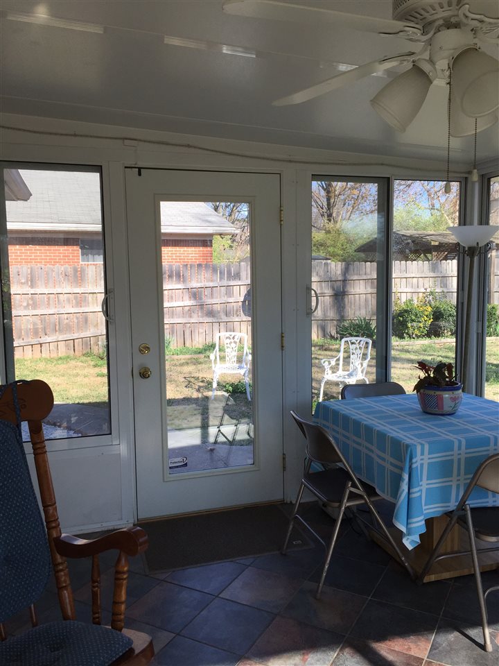 1464 Walton Road Memphis, TN 38117 - Photo 15 of 25 a view of a workspace with furniture and a window