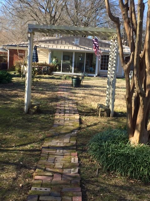 1464 Walton Road Memphis, TN 38117 - Photo 24 of 25 a view of a building with a tree
