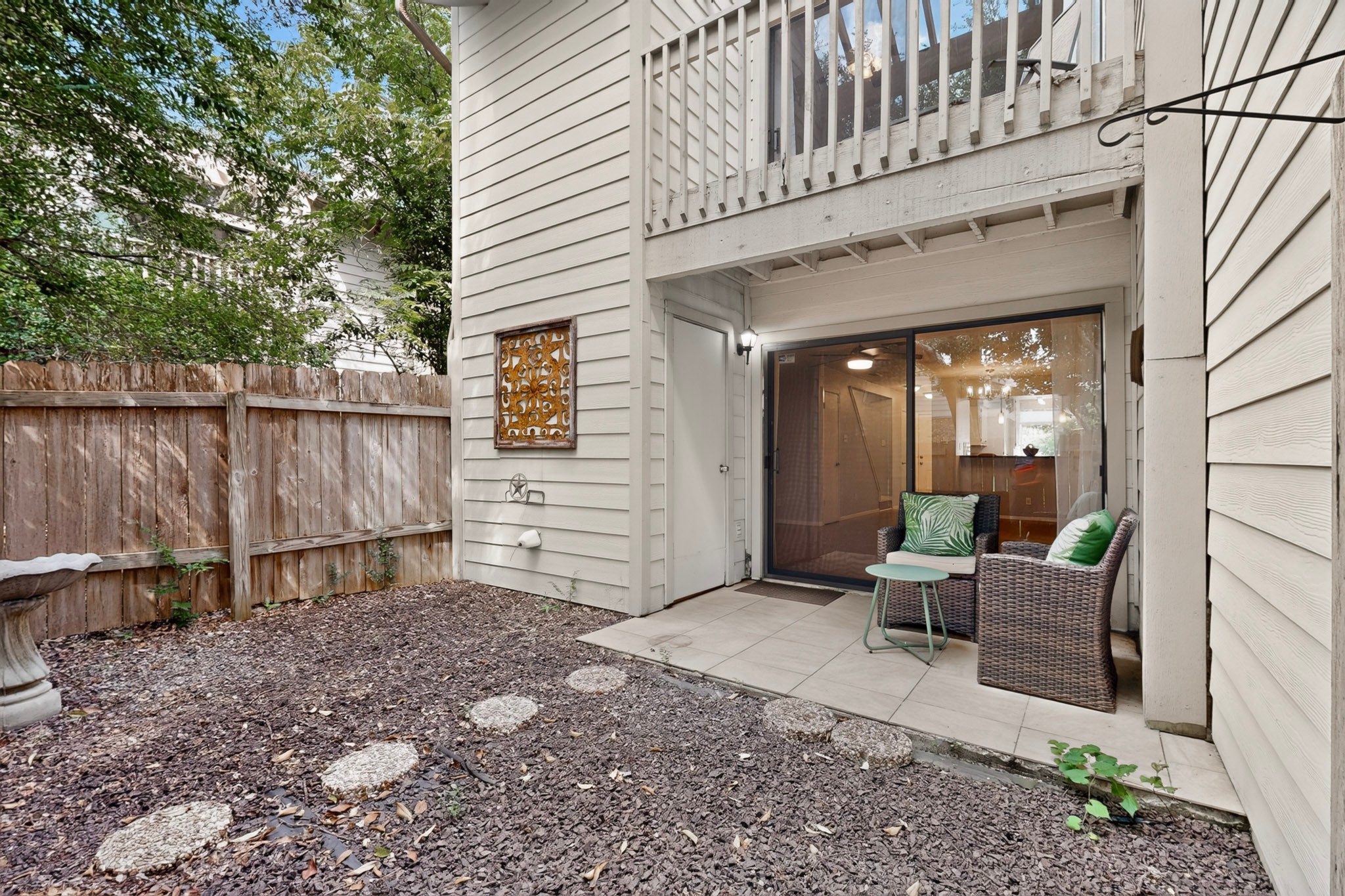 3801 Menchaca Road, Unit 25 Austin, TX 78704 - Photo 22 of 27 Private fenced back patio with storage utility closet