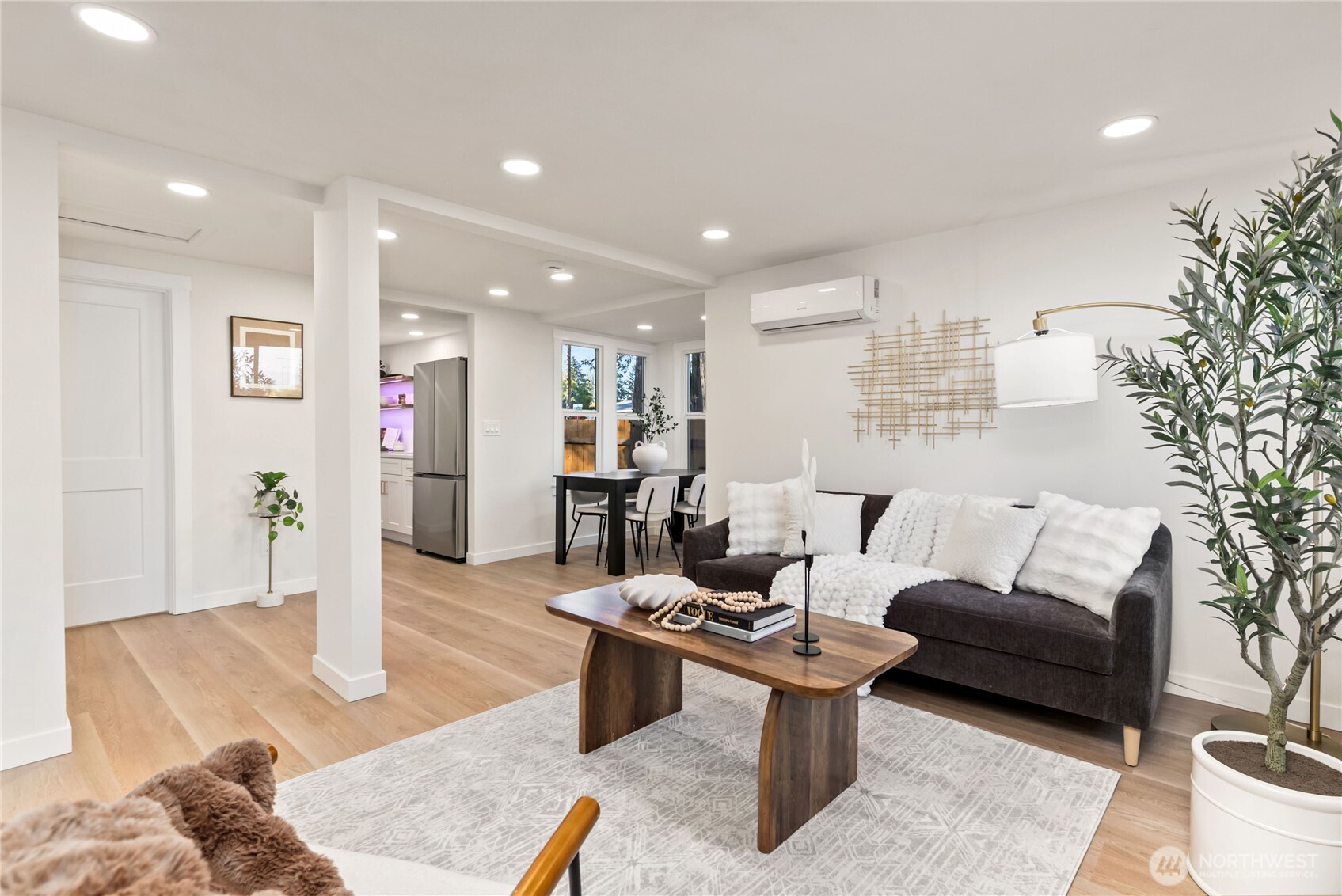 7310 35th Avenue Southwest Seattle, WA 98126 - Photo 11 of 39 a living room with furniture and a couch