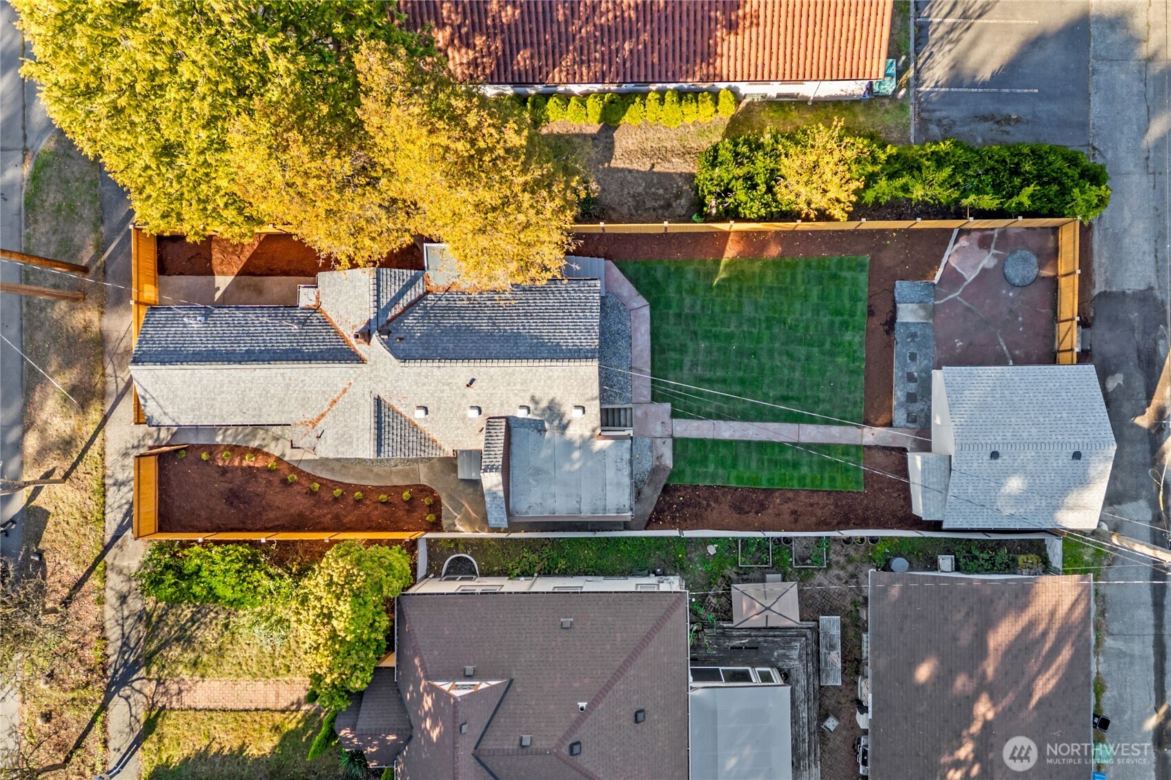 7310 35th Avenue Southwest Seattle, WA 98126 - Photo 35 of 39 an aerial view of a house with a yard basket ball court and outdoor seating