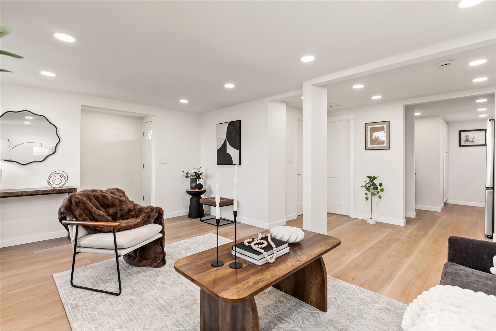 7310 35th Avenue Southwest Seattle, WA 98126 - Photo 10 of 39 a living room with furniture and wooden floor