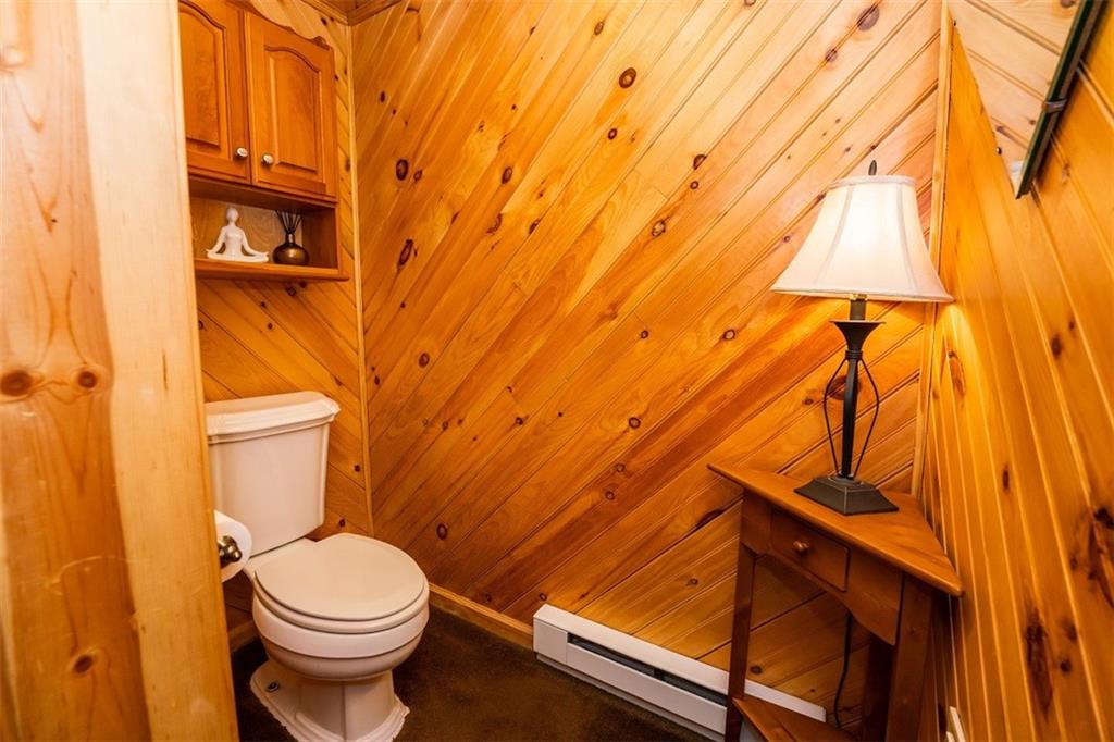 232 Lighthouse Road Commodore, PA 15729 - Photo 11 of 17 a bathroom with a toilet and a shower