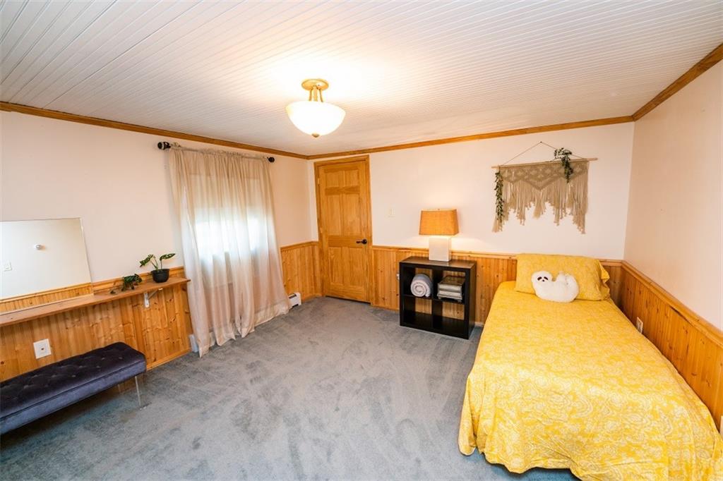 232 Lighthouse Road Commodore, PA 15729 - Photo 14 of 17 a view of a bedroom with furniture and window