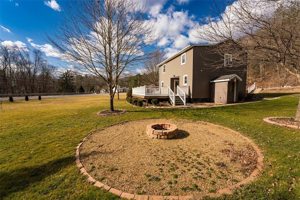 232 Lighthouse Road Commodore, PA 15729 - Photo 15 of 17 a view of a patio with a yard