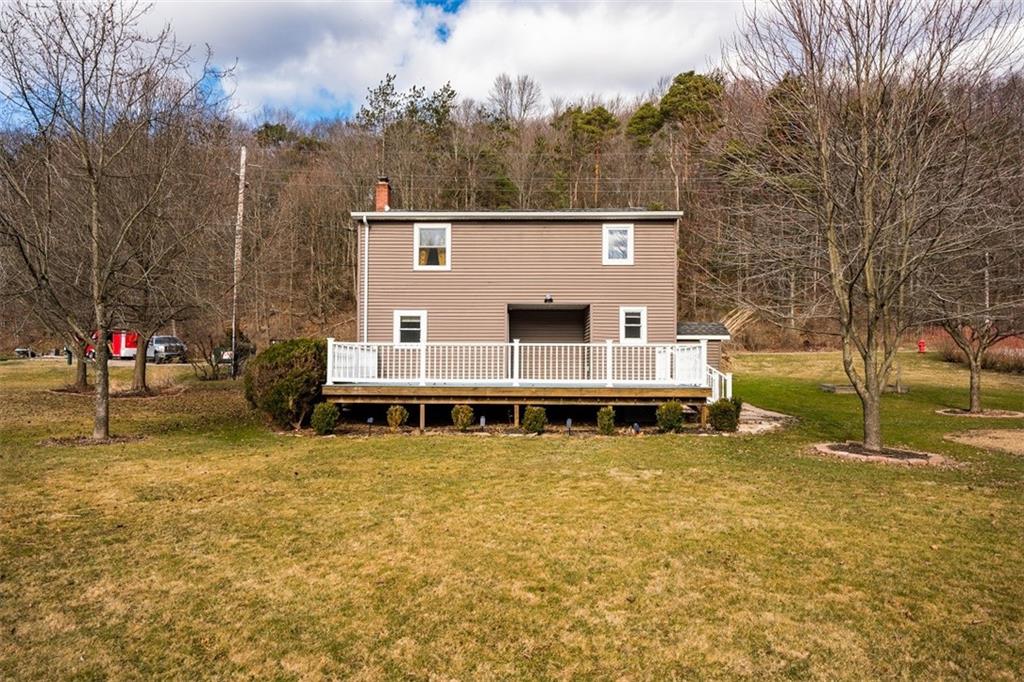 232 Lighthouse Road Commodore, PA 15729 - Photo 16 of 17 a view of a house with a yard balcony and furniture