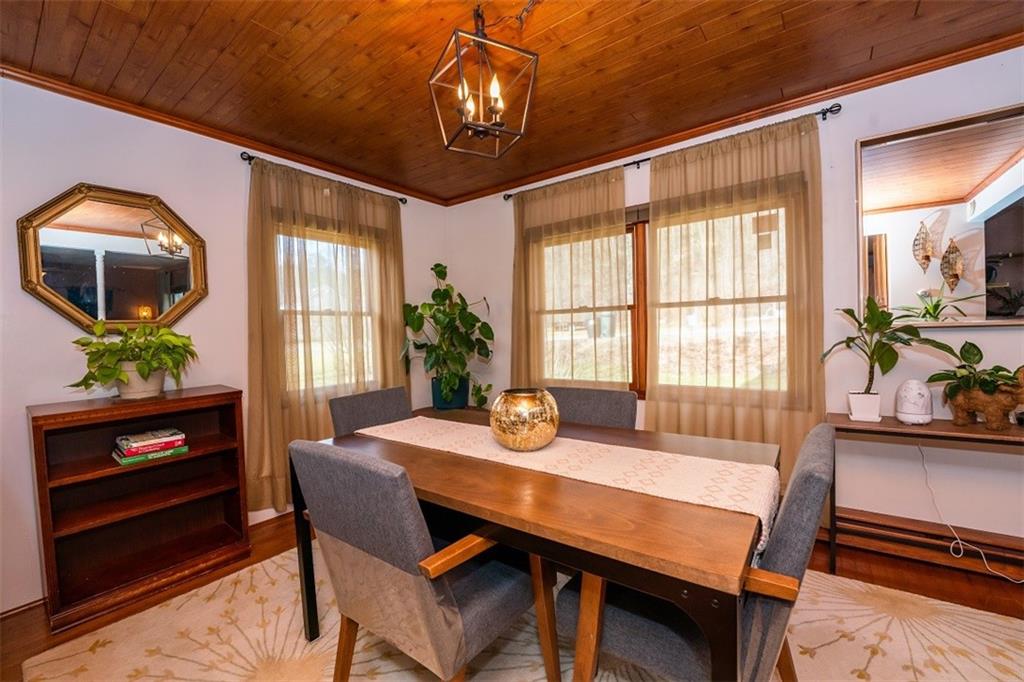 232 Lighthouse Road Commodore, PA 15729 - Photo 5 of 17 a view of a dining room with furniture window and wooden floor