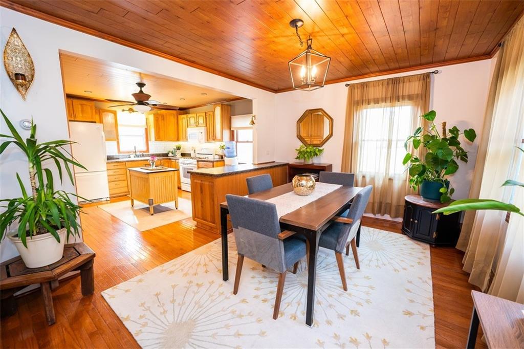 232 Lighthouse Road Commodore, PA 15729 - Photo 7 of 17 a dining room with furniture and wooden floor