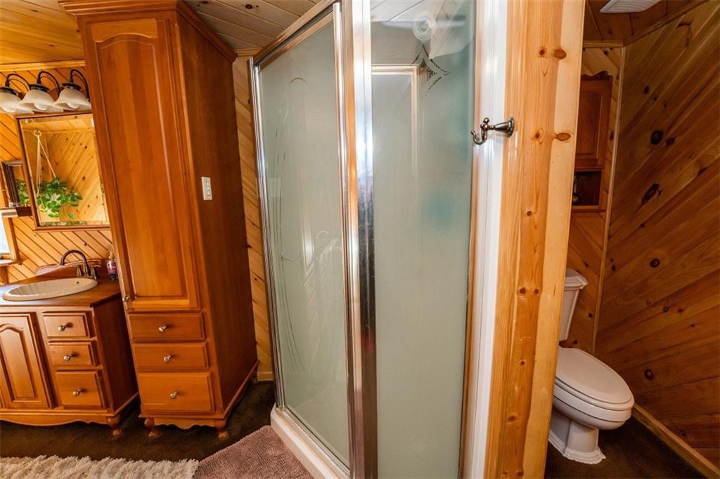 232 Lighthouse Road Commodore, PA 15729 - Photo 10 of 17 a bathroom with a toilet and a shower