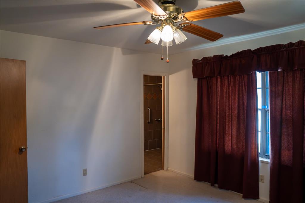 156 Wayman Drive Whitney, TX 76692 - Photo 17 of 20 a view of a livingroom with a ceiling fan and a chandelier fan