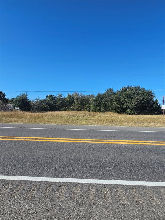 156 Wayman Drive Whitney, TX 76692 - Photo 20 of 20 a view of a swimming pool and a lake
