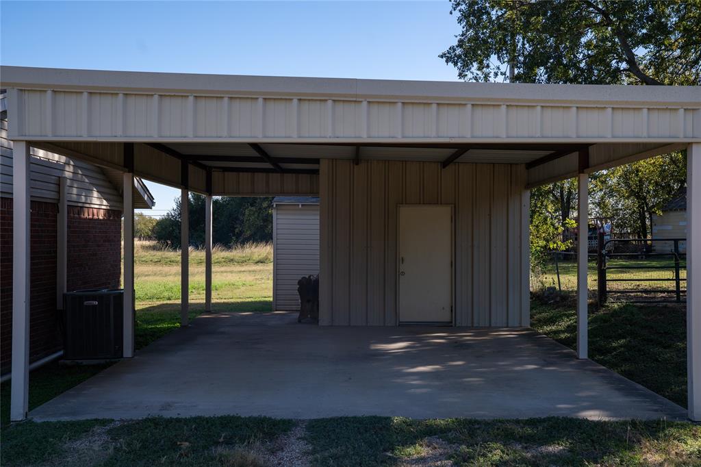 156 Wayman Drive Whitney, TX 76692 - Photo 4 of 17 a view of a car garage