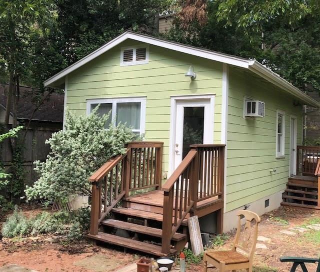 4412 Barrow Avenue, Unit B Austin, TX 78751 - Photo 1 of 1 a front view of house with deck and yard