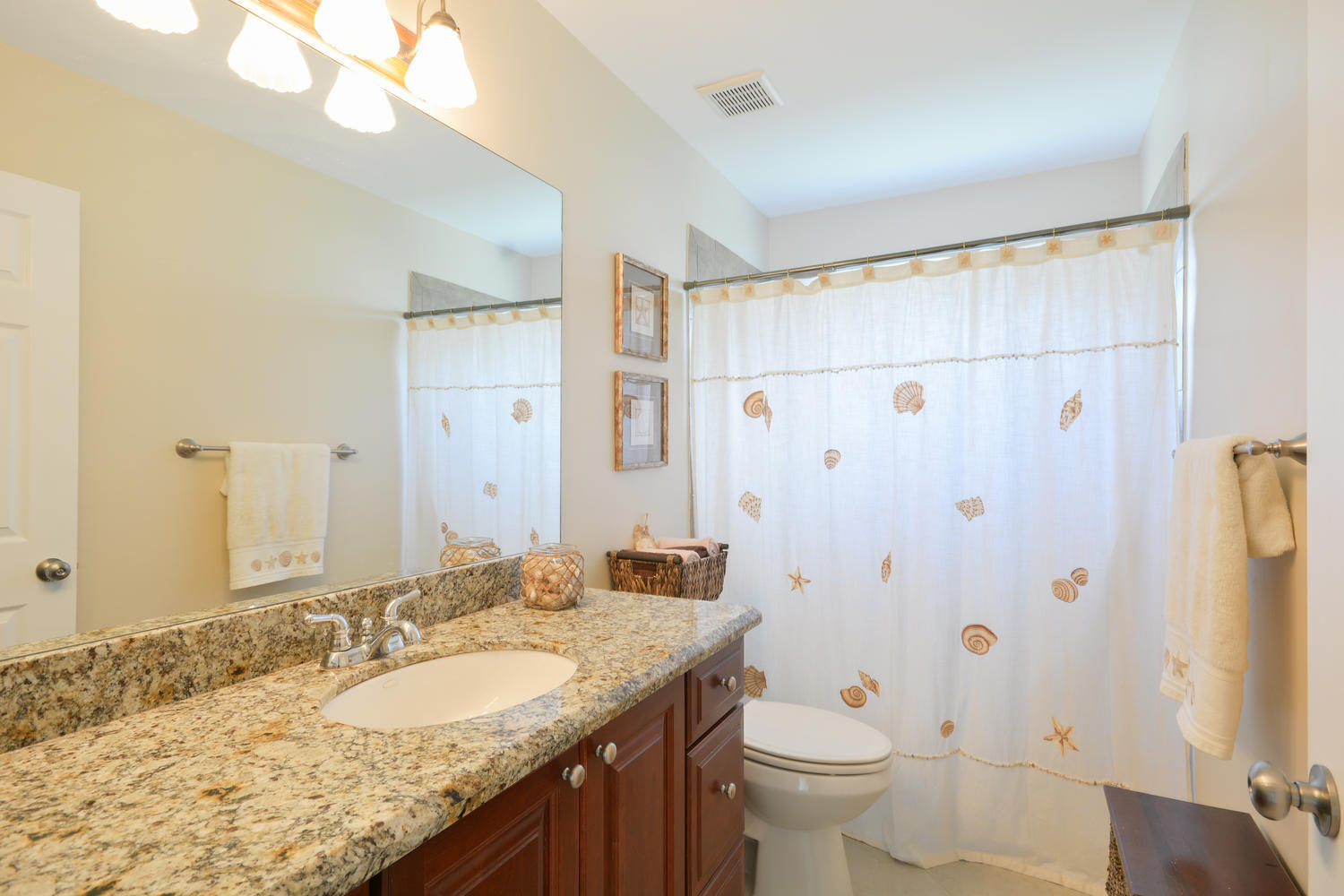 22166 Appleton Drive Boca Raton, FL 33428 - Photo 20 of 47 a bathroom with a granite countertop sink toilet and shower