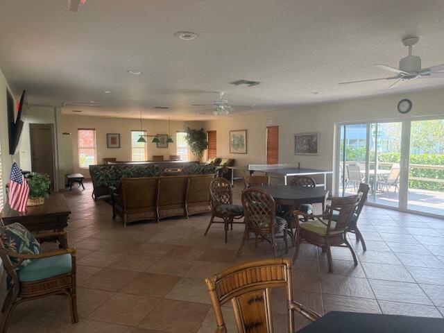 5520 North Ocean Boulevard, Unit 111 Ocean Ridge, FL 33435 - Photo 60 of 63 a view of a dining room with furniture window and outside view