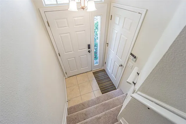 a view of an entryway with staircase