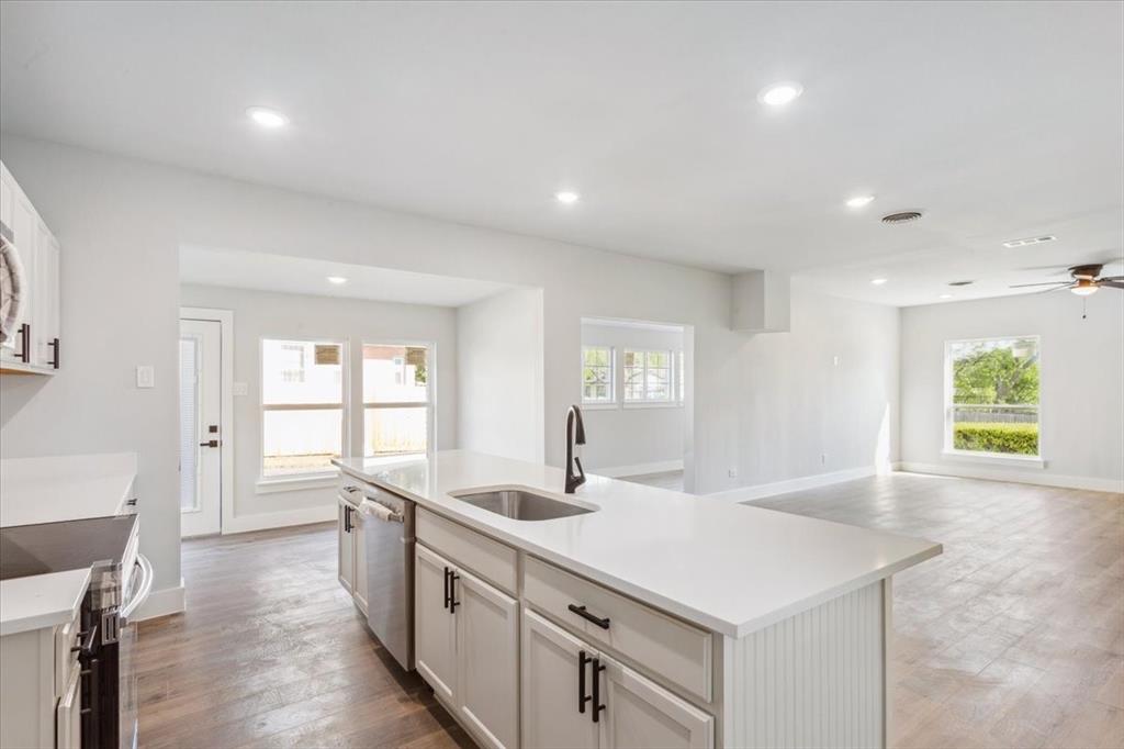 900 North 22nd Street Waco, TX 76707 - Photo 11 of 37 a kitchen with counter top space sink and appliances