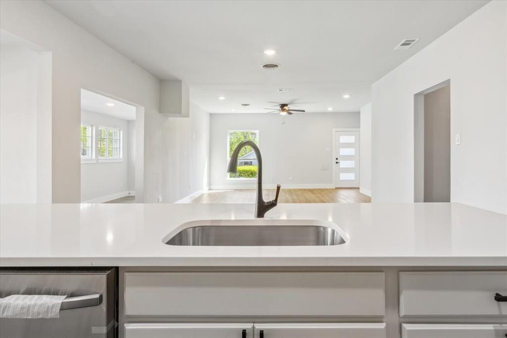 900 North 22nd Street Waco, TX 76707 - Photo 12 of 37 a kitchen with a sink and a window