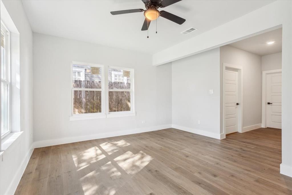 900 North 22nd Street Waco, TX 76707 - Photo 19 of 37 wooden floor in an empty room with a window