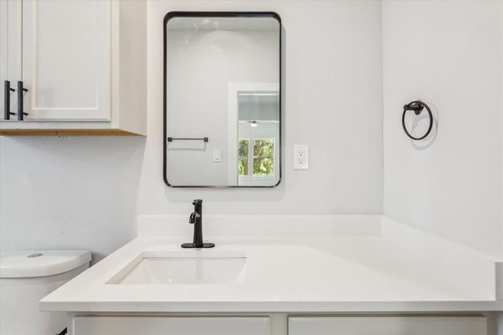 900 North 22nd Street Waco, TX 76707 - Photo 22 of 37 a bathroom with a bathtub and a sink