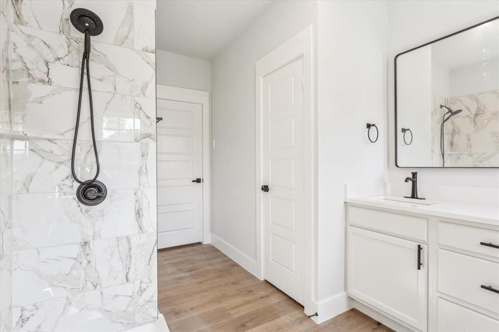 900 North 22nd Street Waco, TX 76707 - Photo 26 of 37 a bathroom with a sink and mirror