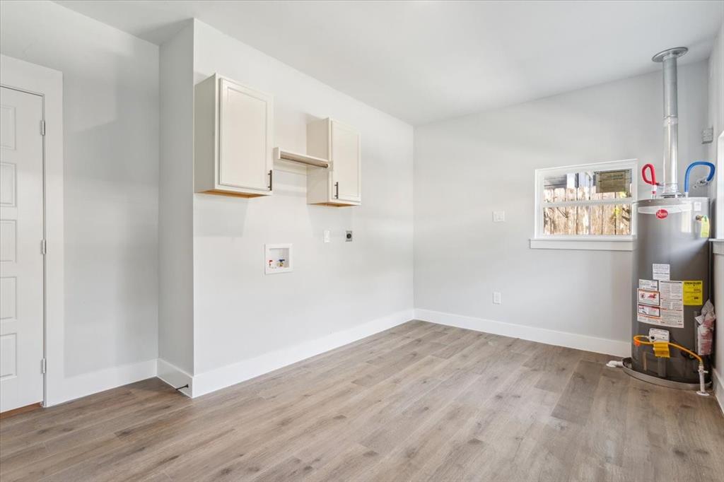 900 North 22nd Street Waco, TX 76707 - Photo 30 of 37 a view of kitchen with wooden floor
