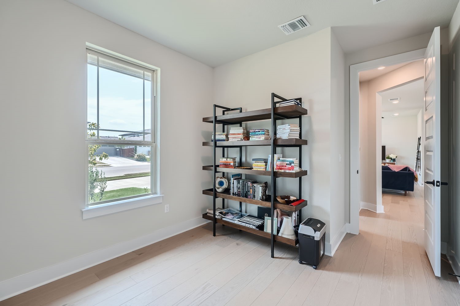 8319 Laughlin Lane Austin, TX 78744 - Photo 13 of 26 One of the bedrooms is conveniently located on the first floor, making it an ideal office or guest suite.