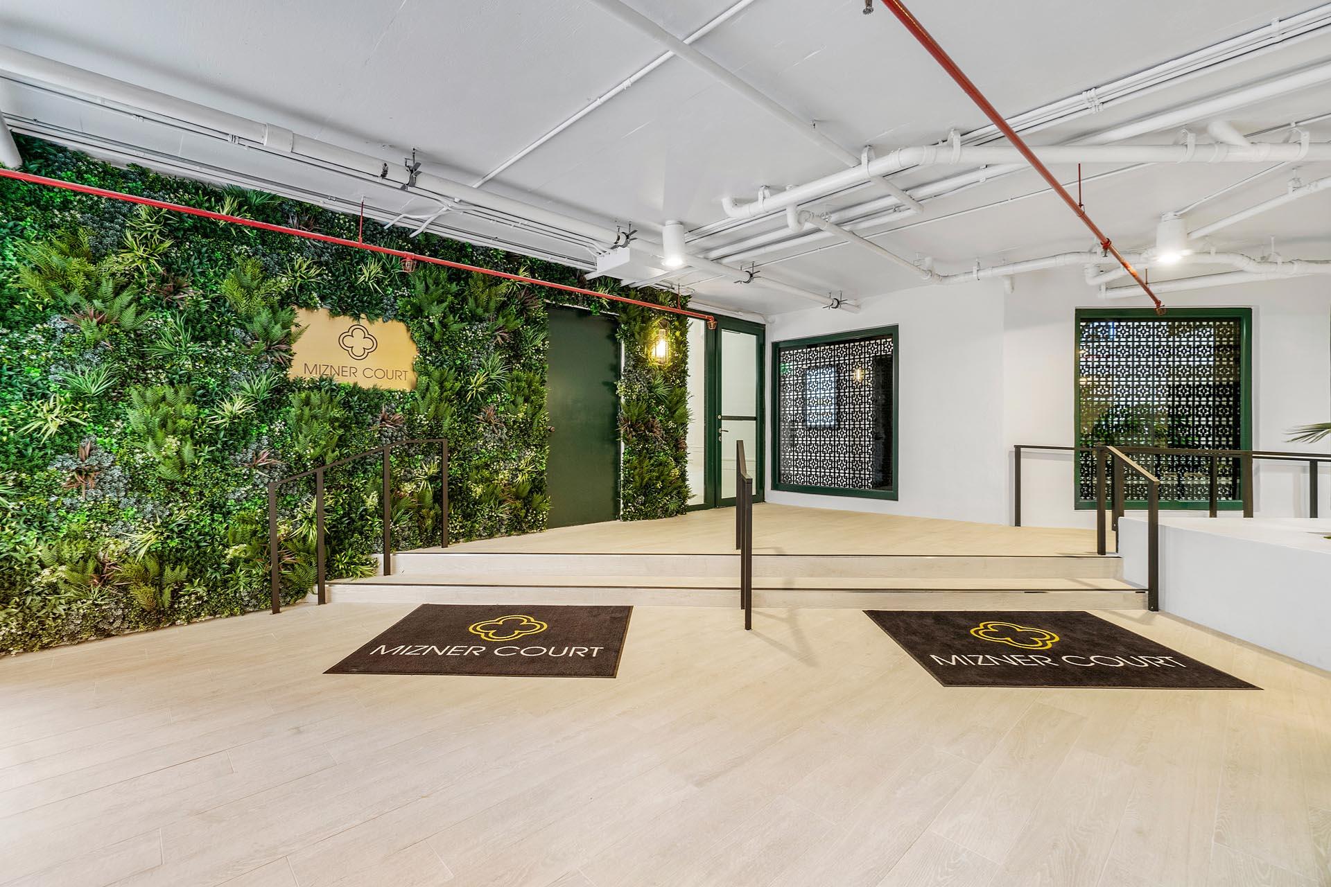 100 Southeast 5th Avenue, Unit 416 Boca Raton, FL 33432 - Photo 29 of 42 a view of an entryway with a small garden