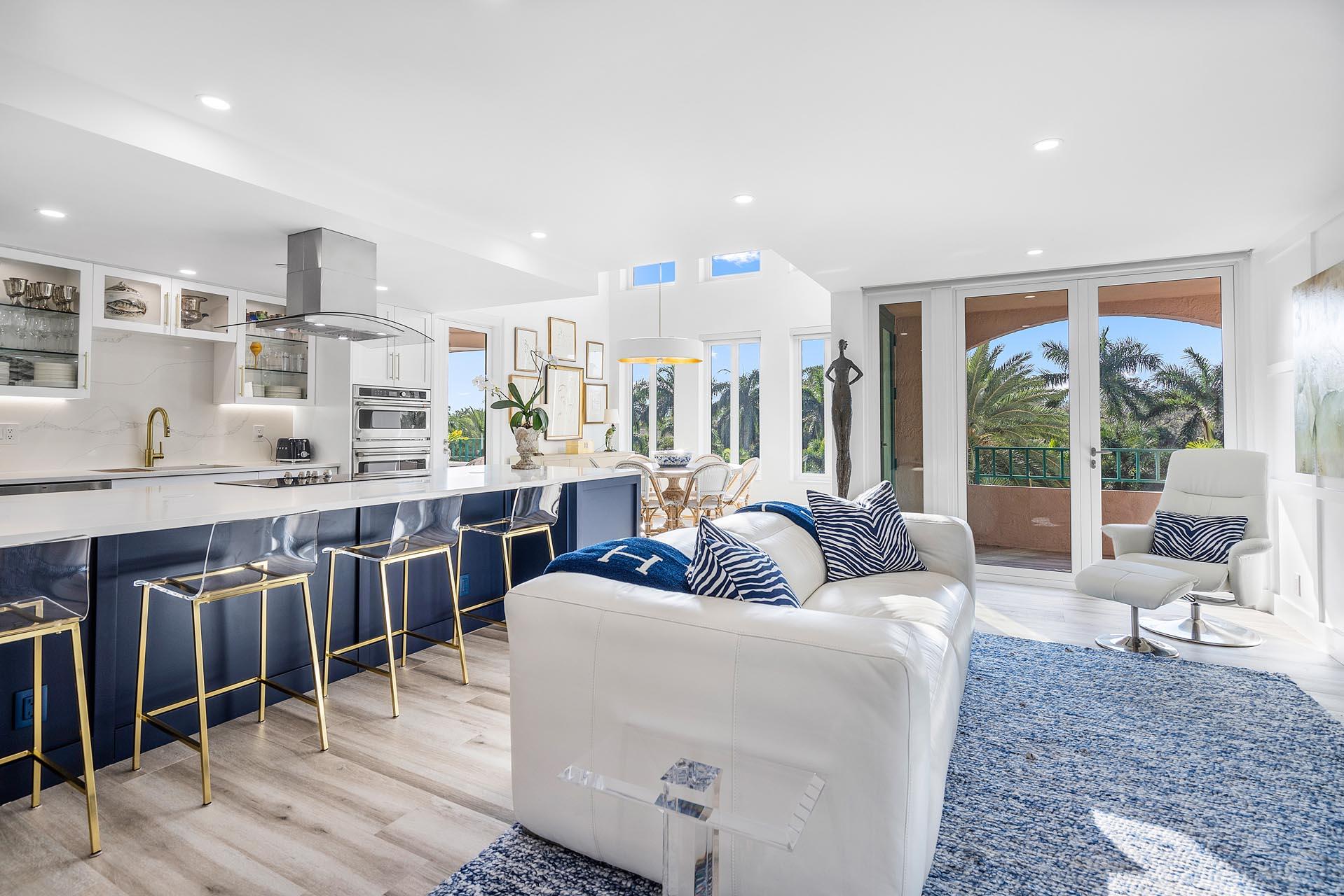 100 Southeast 5th Avenue, Unit 416 Boca Raton, FL 33432 - Photo 3 of 42 a living room with furniture and a large window