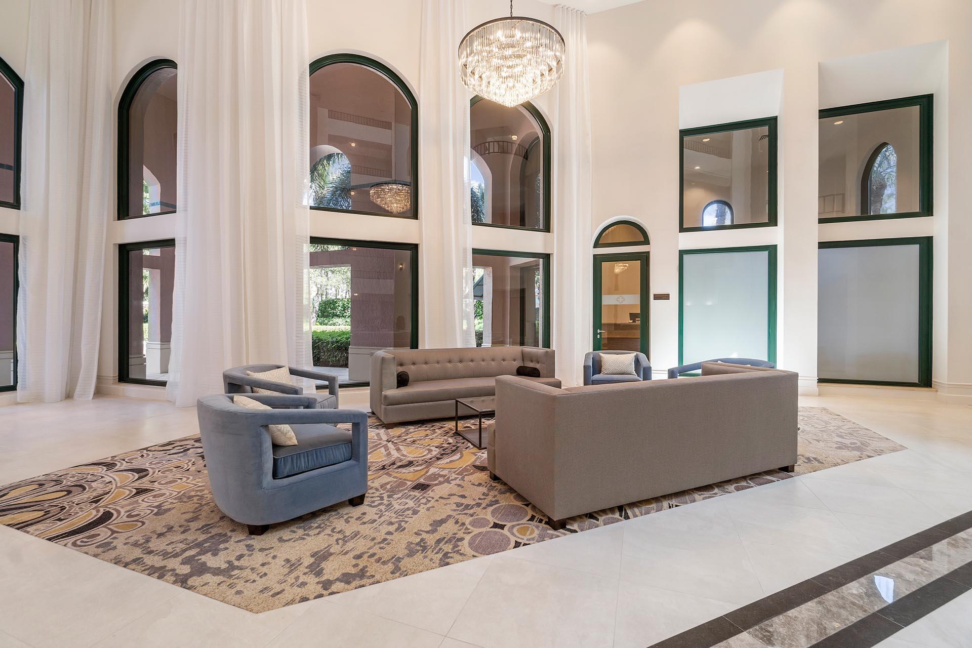 100 Southeast 5th Avenue, Unit 416 Boca Raton, FL 33432 - Photo 32 of 42 a living room with fireplace furniture and decor