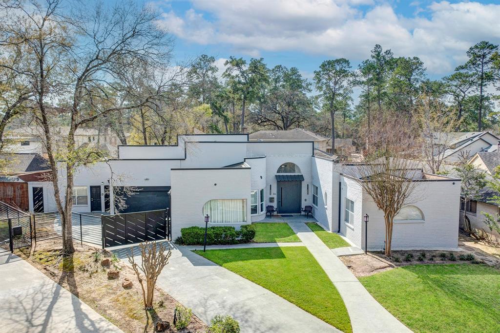 Tealwood Contemporary on an oversized lot 1,825 sq ft.  Offers 5/6 beds and 4 full and 2 half baths.  Resort style outdoor spaces and Pitched Standing seam roof