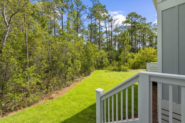 a view of a swimming pool with an outdoor space and seating area