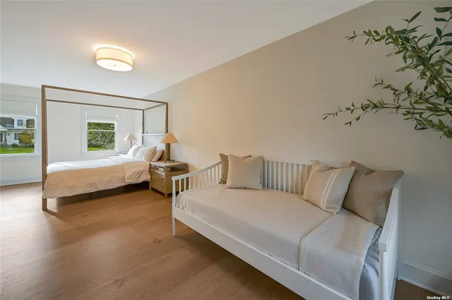 a bed room with a bed and a couch