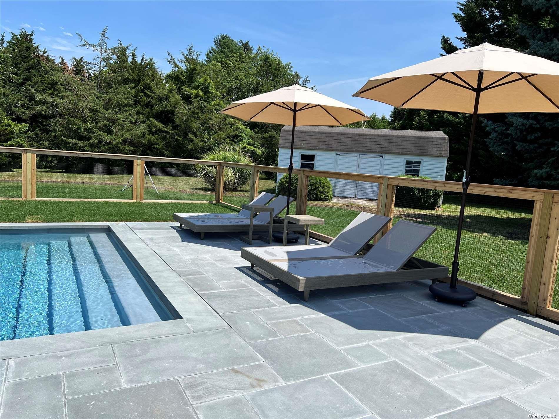 Undisclosed Address Mattituck, NY 11952 - Photo 23 of 35 a view of a backyard with sitting area