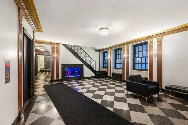 a view of a bathroom from the hallway