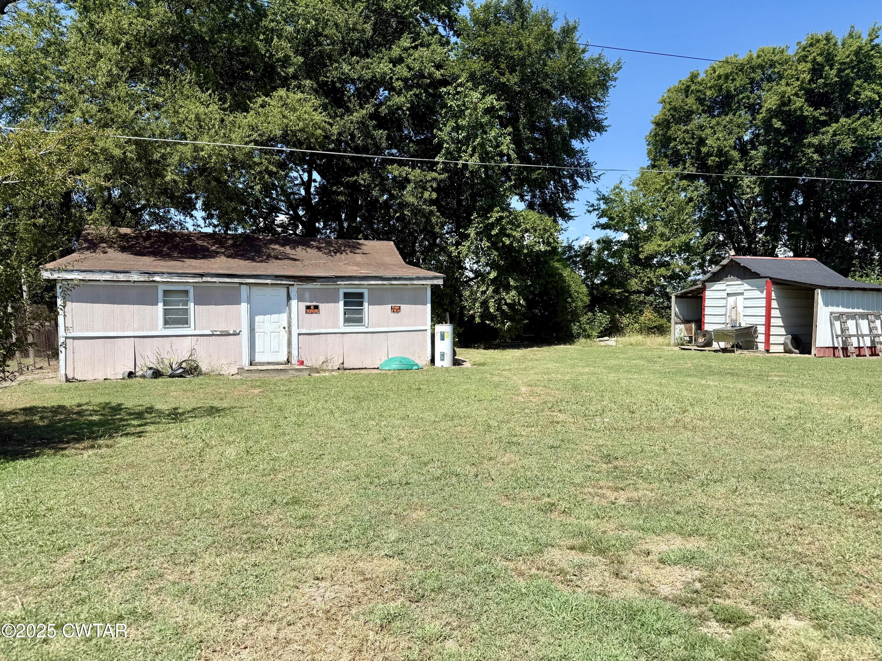 4010 Highway 78 Ridgely, TN 38080 - Photo 17 of 21 a view of house with backyard