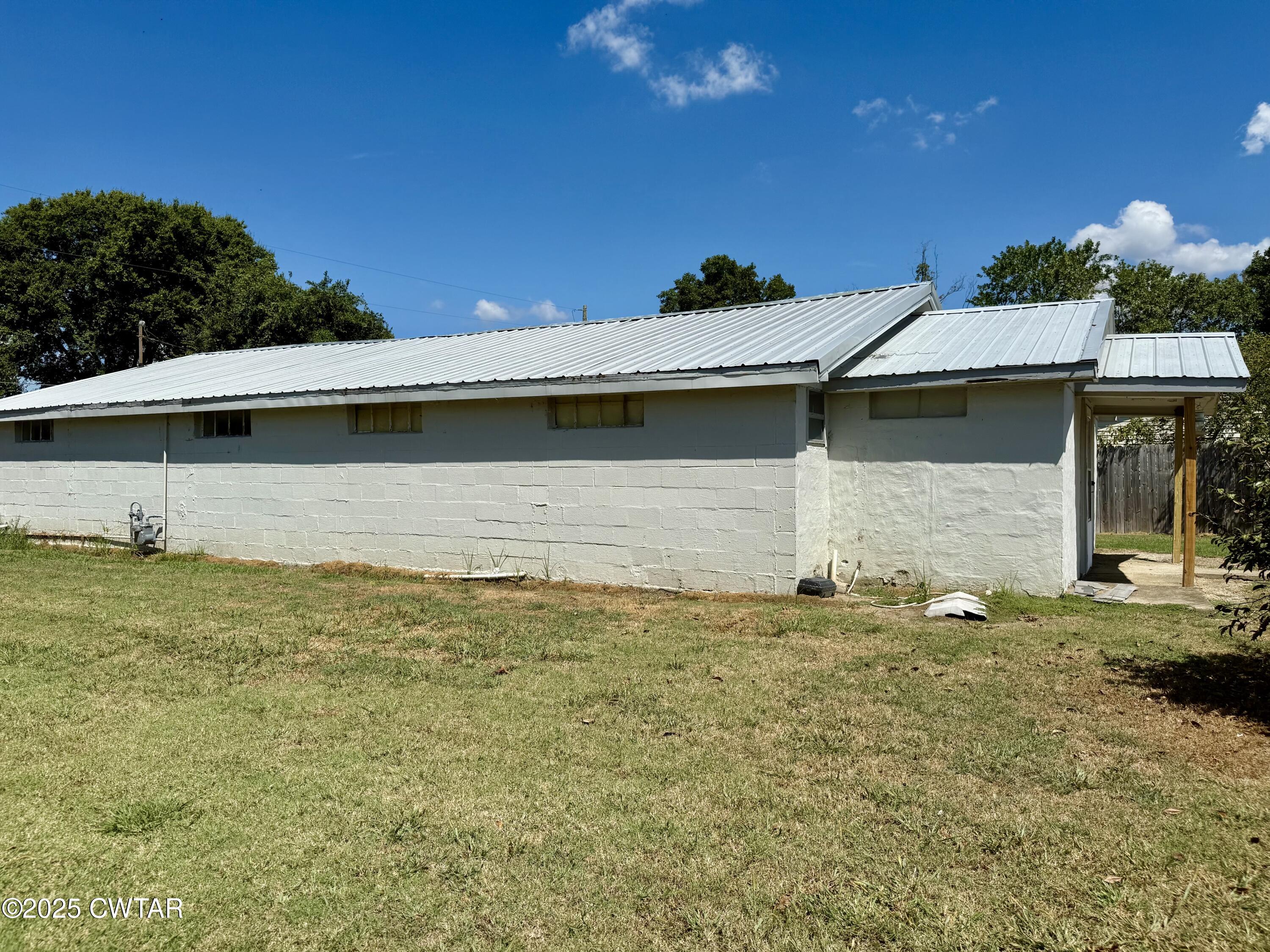 4010 Highway 78 Ridgely, TN 38080 - Photo 20 of 21 a front view of a house with a yard