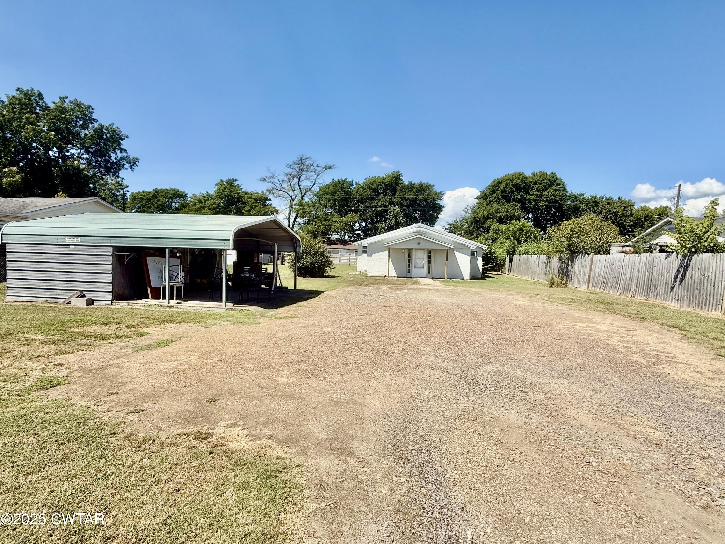 4010 Highway 78 Ridgely, TN 38080 - Photo 2 of 21 a view of a house with backyard and trees