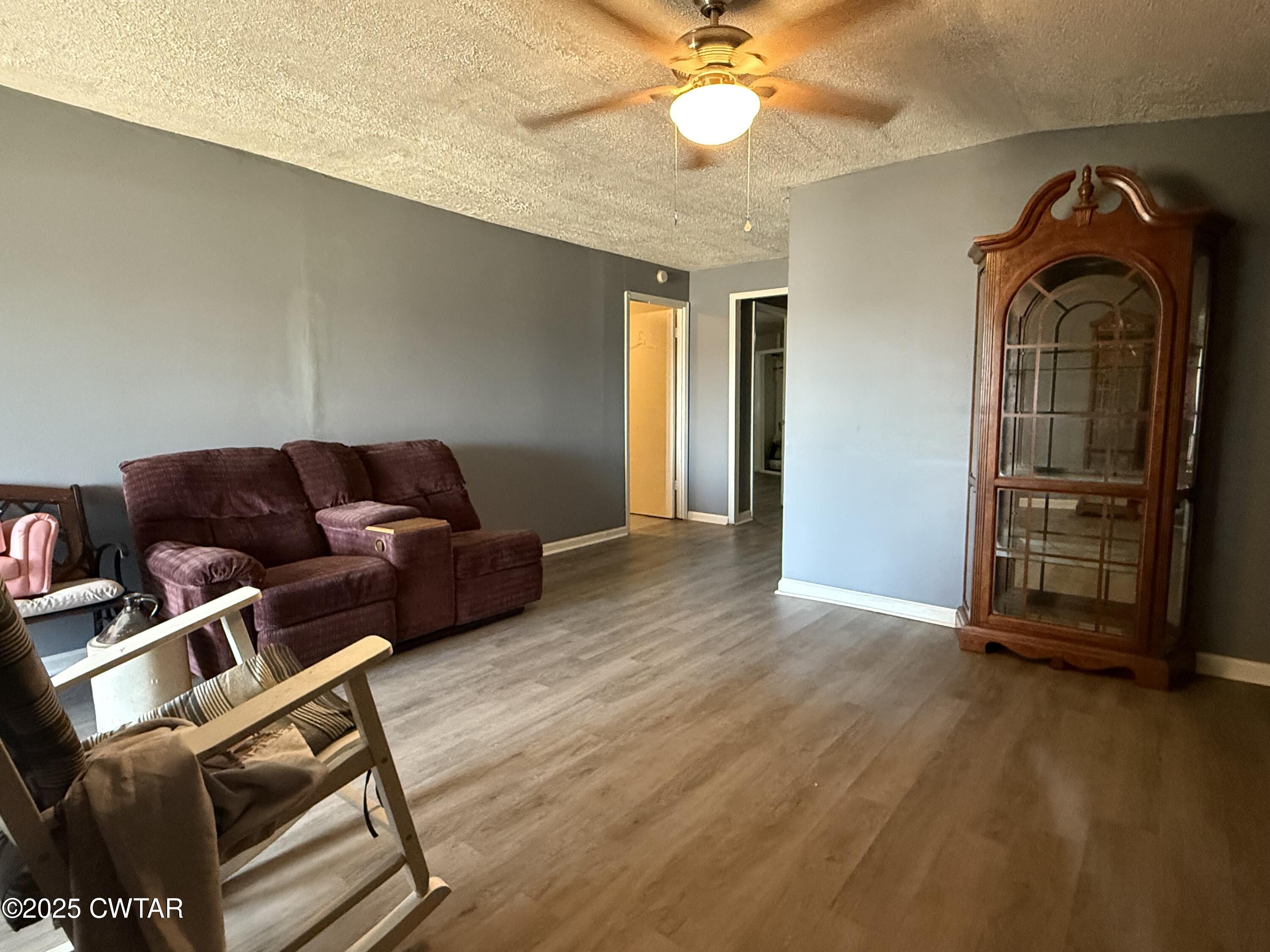 4010 Highway 78 Ridgely, TN 38080 - Photo 4 of 21 a living room with furniture and a wooden floor