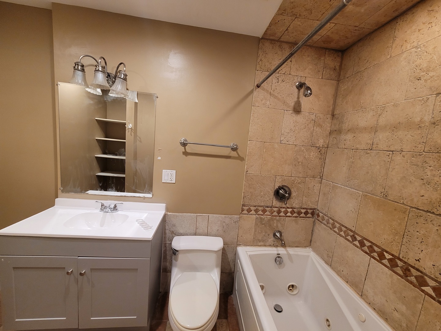 306 Inverrary Lane Deerfield, IL 60015 - Photo 17 of 23 a bathroom with a bathtub shower sink mirror and toilet