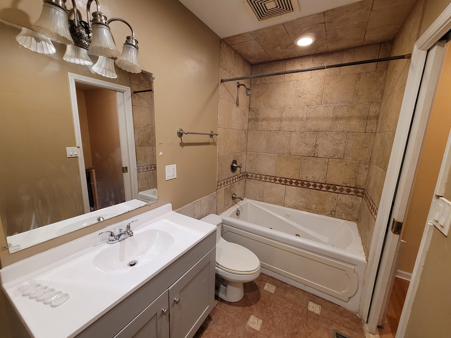306 Inverrary Lane Deerfield, IL 60015 - Photo 18 of 23 a bathroom with a sink a toilet and shower