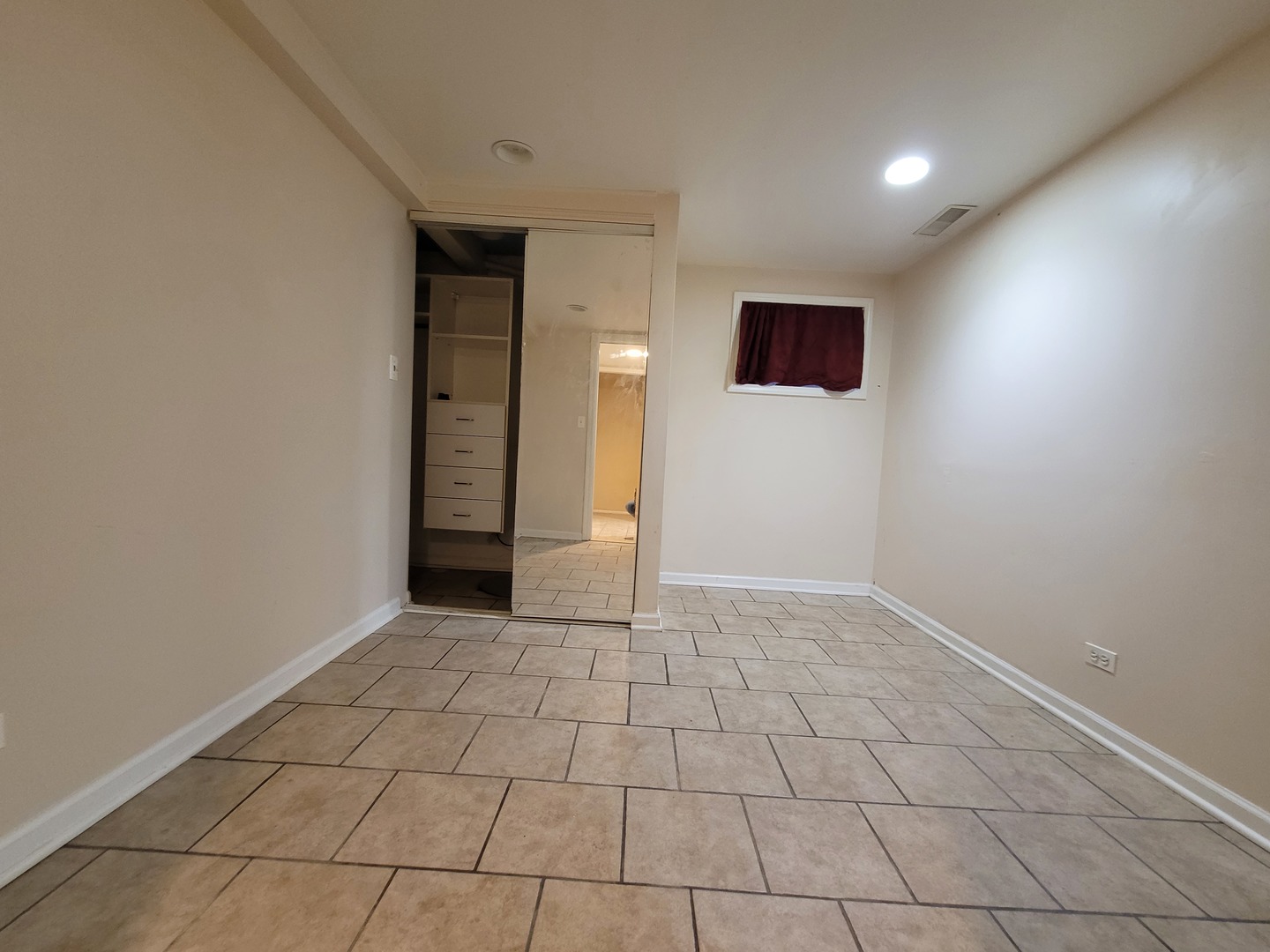 306 Inverrary Lane Deerfield, IL 60015 - Photo 19 of 23 a view of a livingroom with an empty space and a window