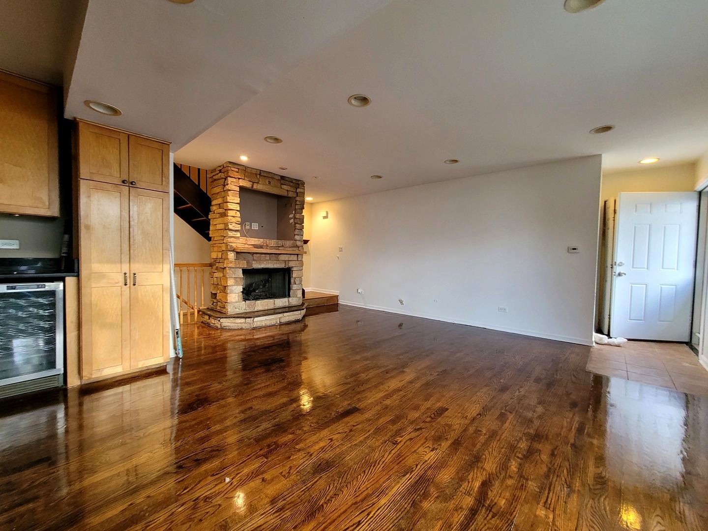 306 Inverrary Lane Deerfield, IL 60015 - Photo 8 of 23 a view of empty room with wooden floor and fireplace