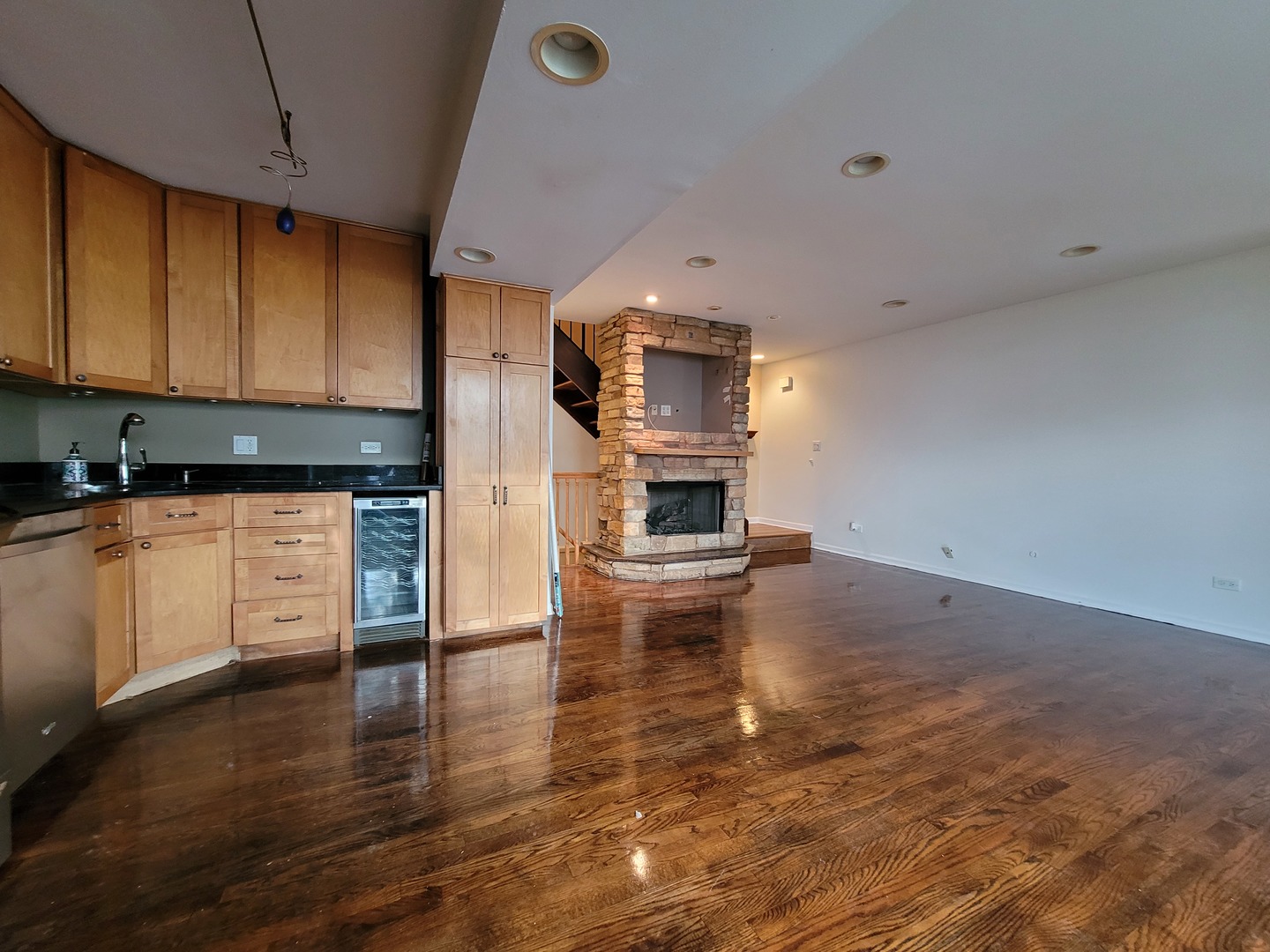 306 Inverrary Lane Deerfield, IL 60015 - Photo 9 of 23 a kitchen with granite countertop a stove and a wooden floors