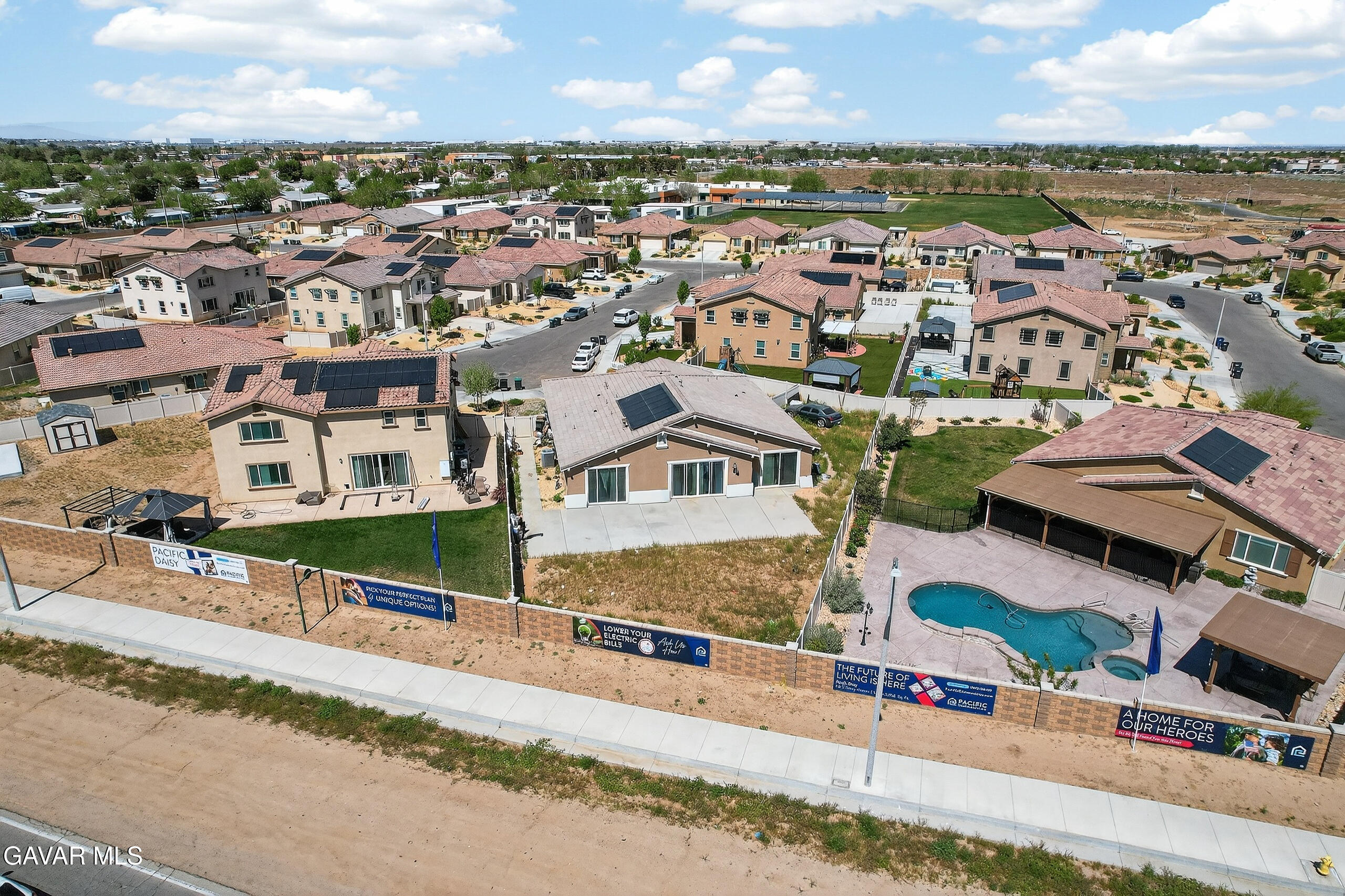 38018 Periwinkle Place Palmdale, CA 93550 - Photo 32 of 32 an aerial view of residential houses with outdoor space and ocean view