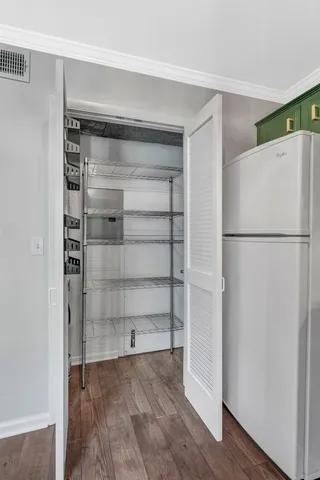 a view of an empty walk in closet