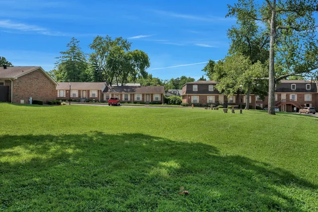 a view of a house with a big yard