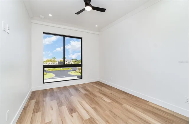 an empty room with large window
