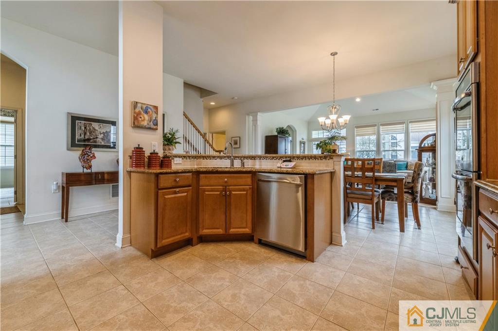 18 Mandrake Road Monroe Township, NJ 08831 - Photo 12 of 44 a kitchen with lots of counter top space and appliances